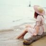 ocean to explore girl sitting at beach