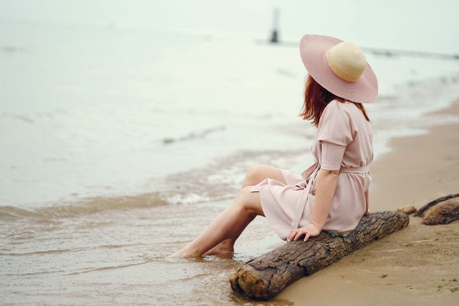 ocean to explore girl sitting at beach