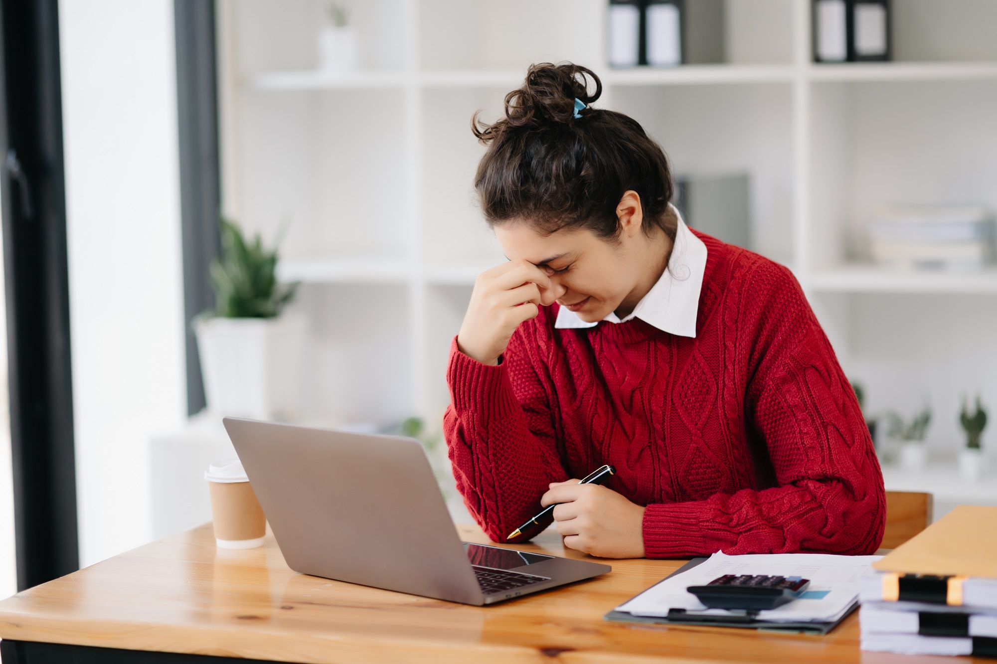 young woman crying hard