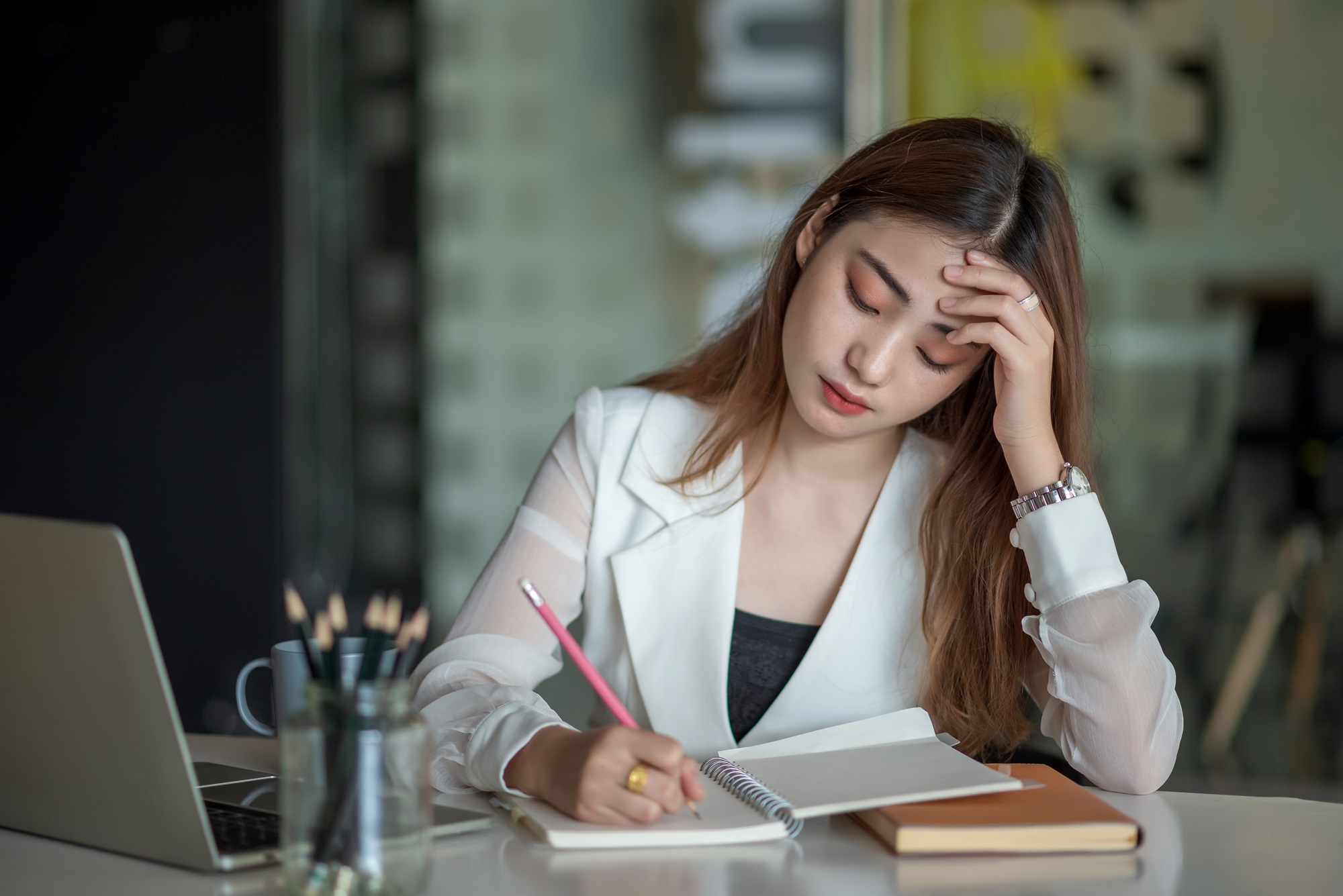 woman writing an apology letter