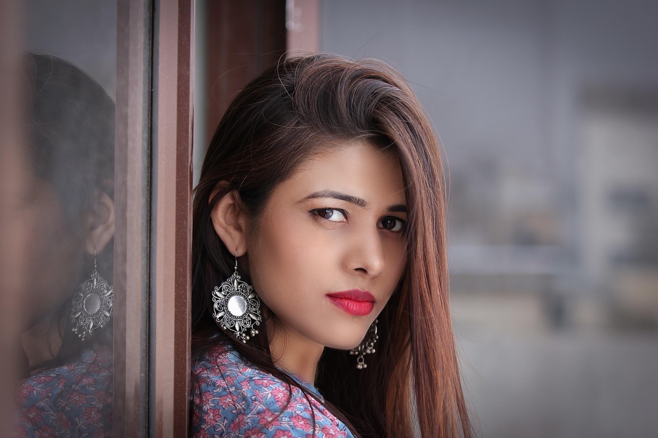 woman pose style earrings