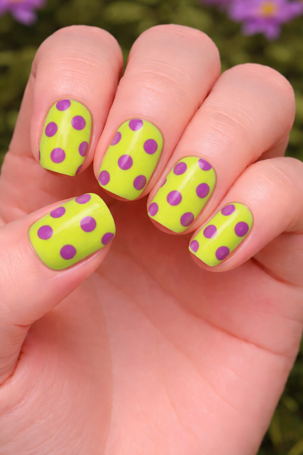 Cute Spring nails - Neon green nails with purple dots
