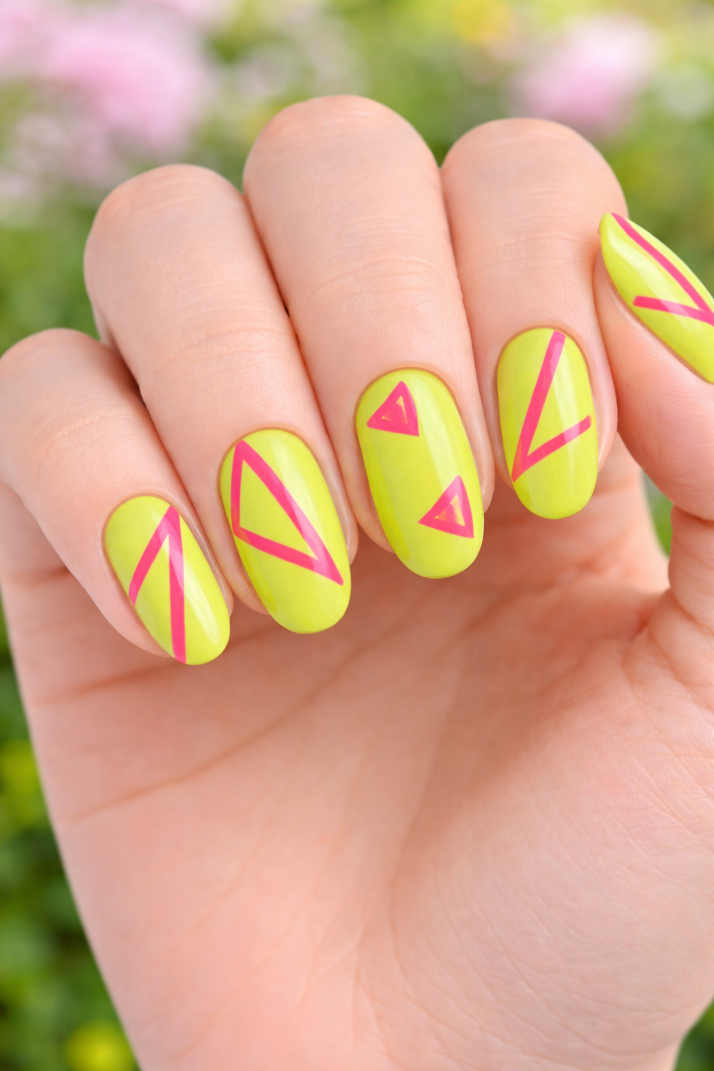 Vibrant neon geometric nail art