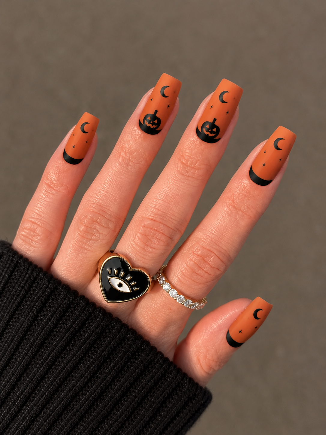 pumpkin moonlight nail designs for halloween