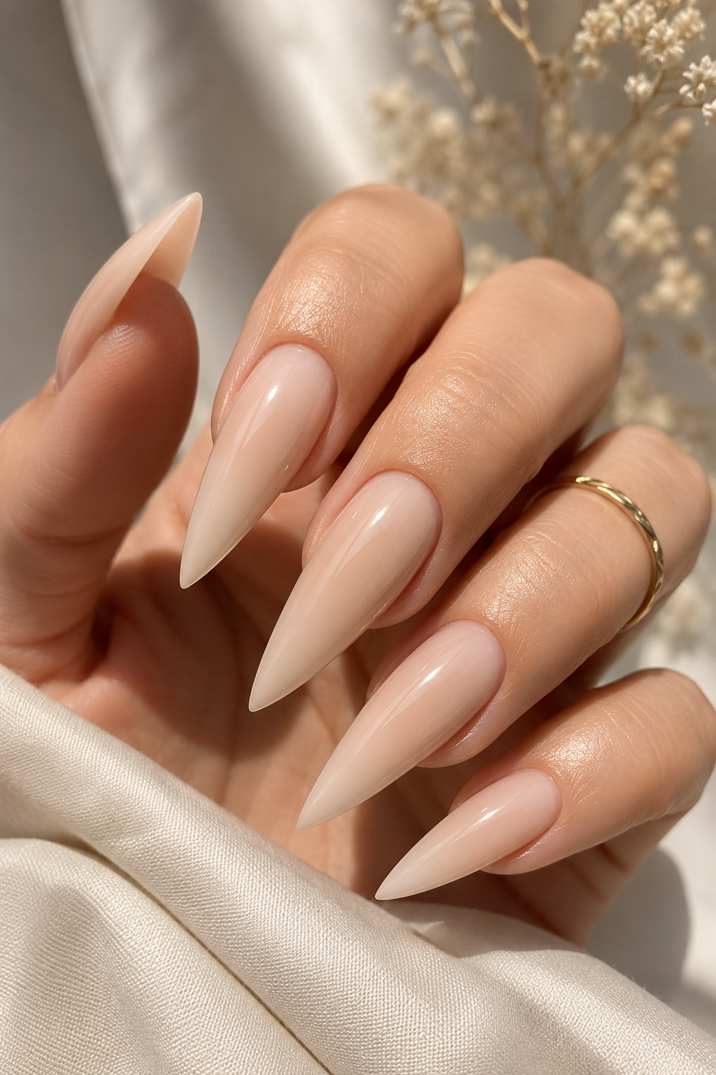 Milky Nude Stiletto Nails