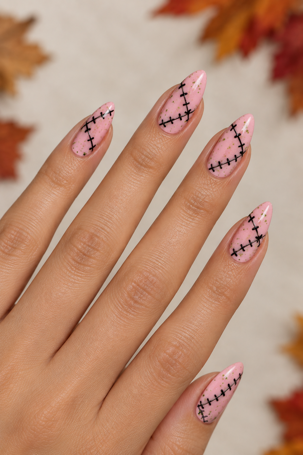 Soft Pink Stitched Halloween Nails