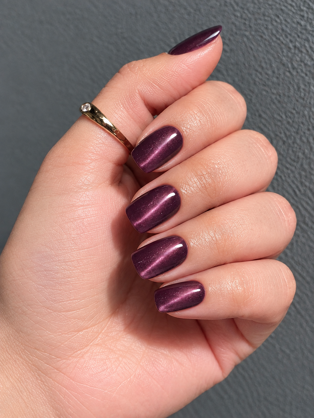 plum cat eye nail design for fall